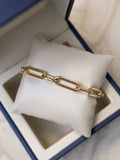 Aurella paperclip necklace and Duetto link bracelet in gold, worn together