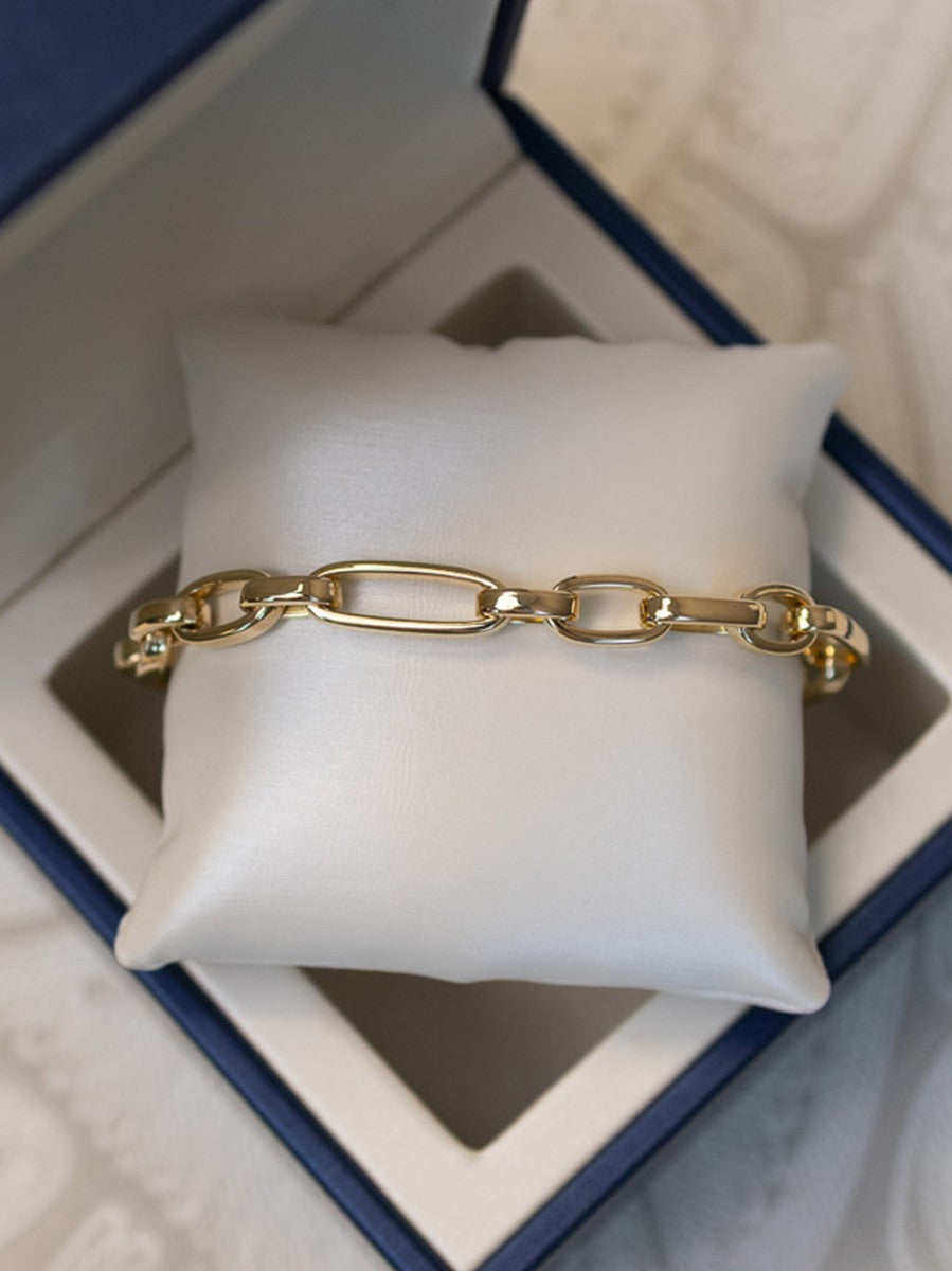 Gold Duetto link bracelet with round links in two sizes