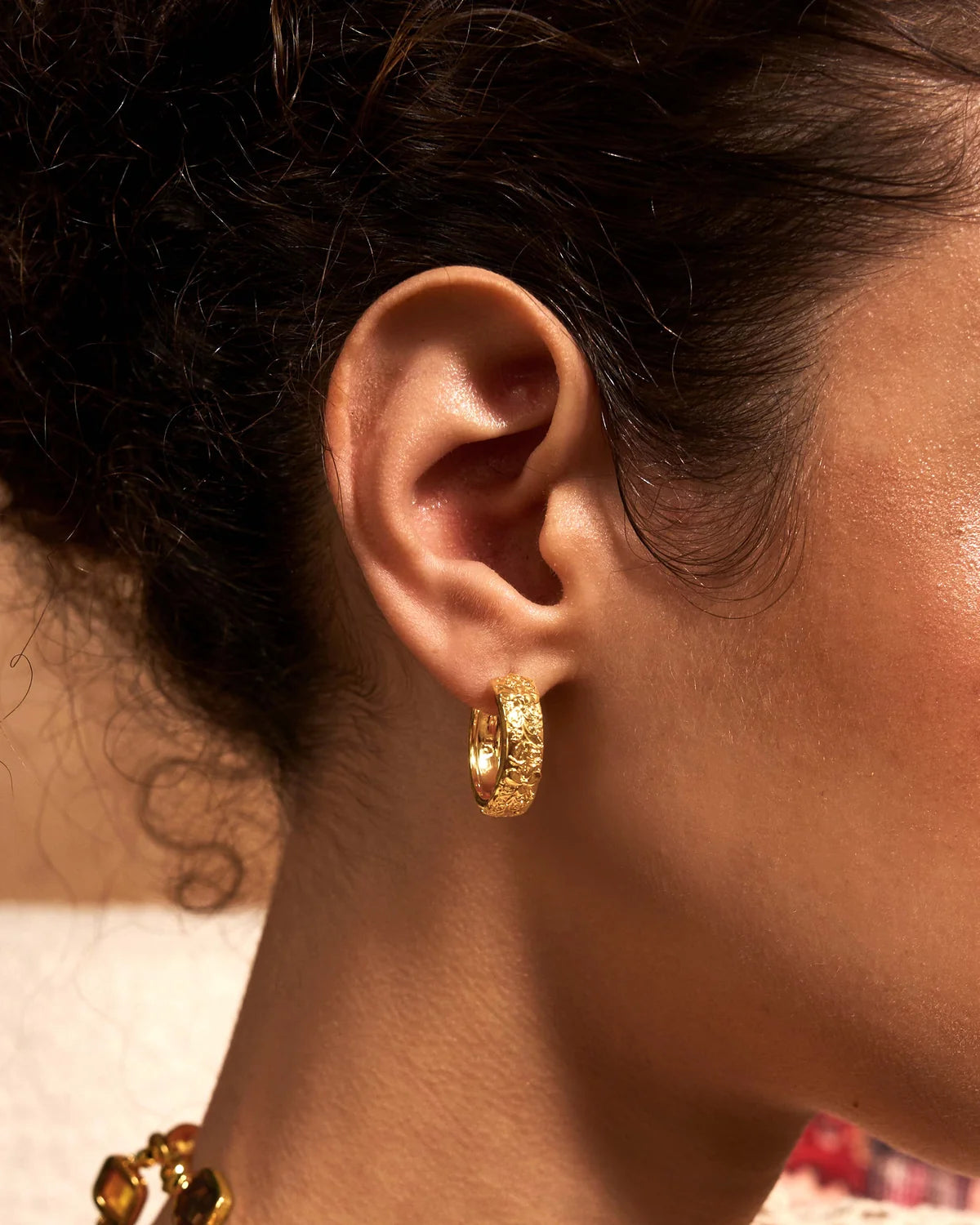 Orchid hoops in gold, worn