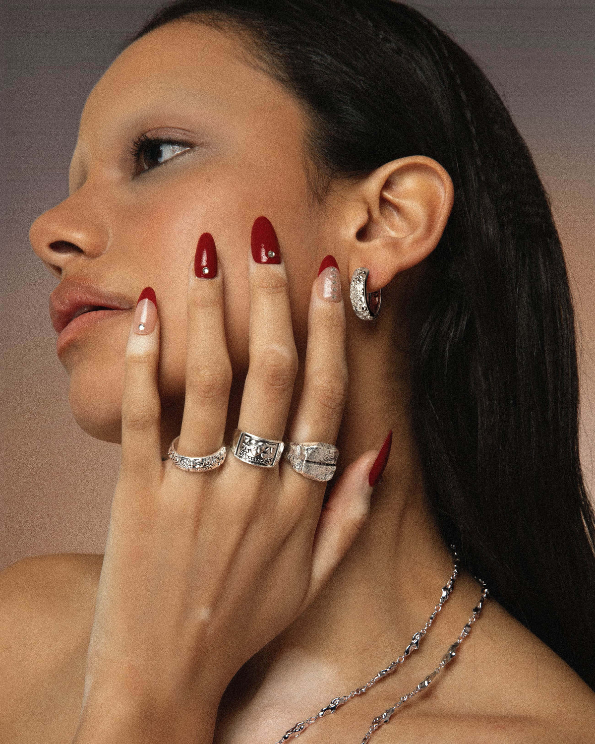 Silver Orchid Hoop worn by a model